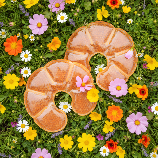 Two therapy packs on a bed of flowers