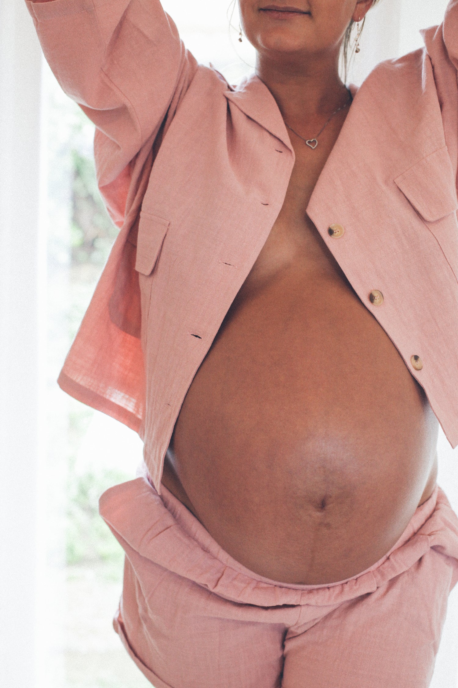 Pregnant women showing belly